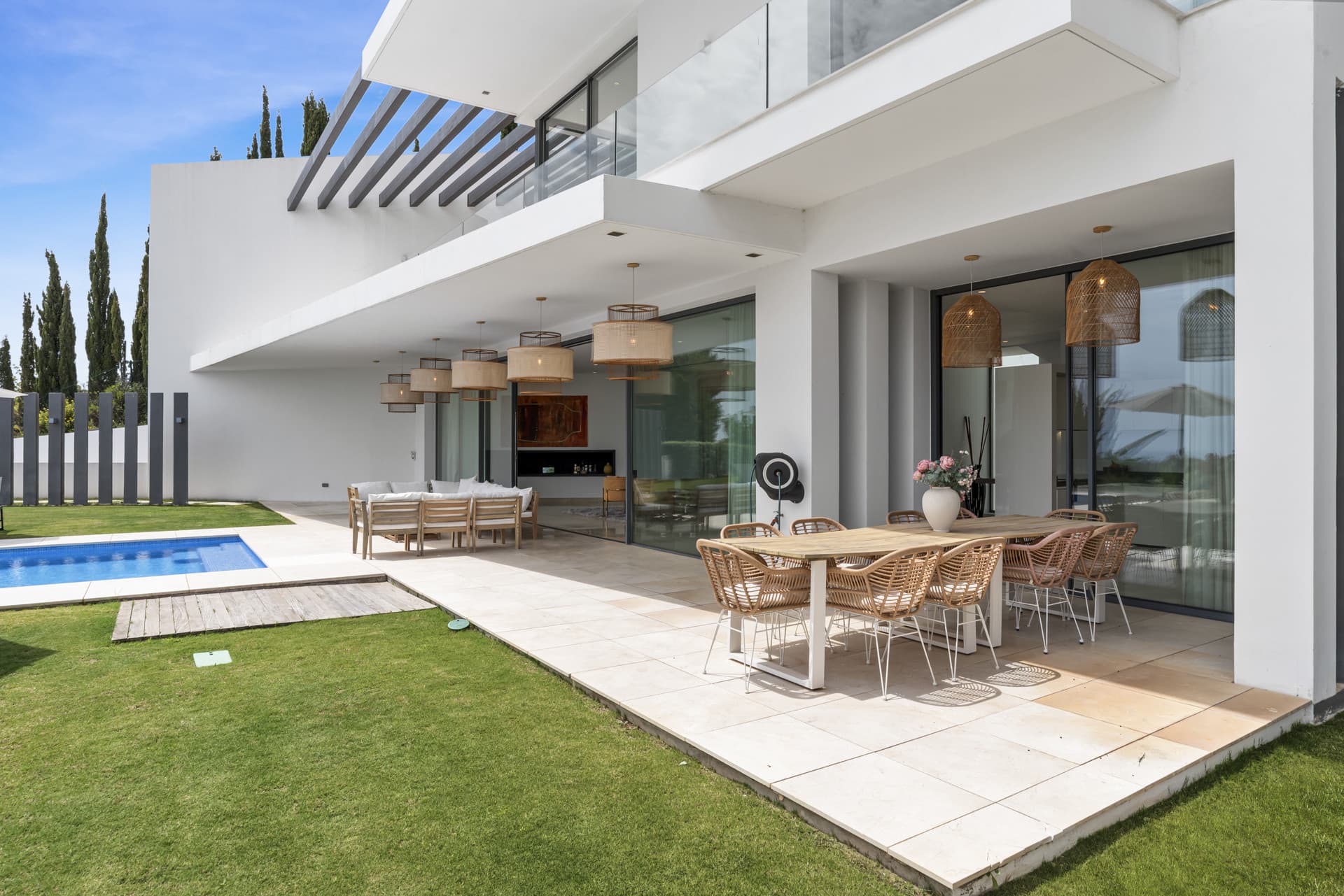 Sophisticated Villa With Panoramic Vistas and Lush Greenery Set in the prestigious enclave of La Alquería in Benahavís,