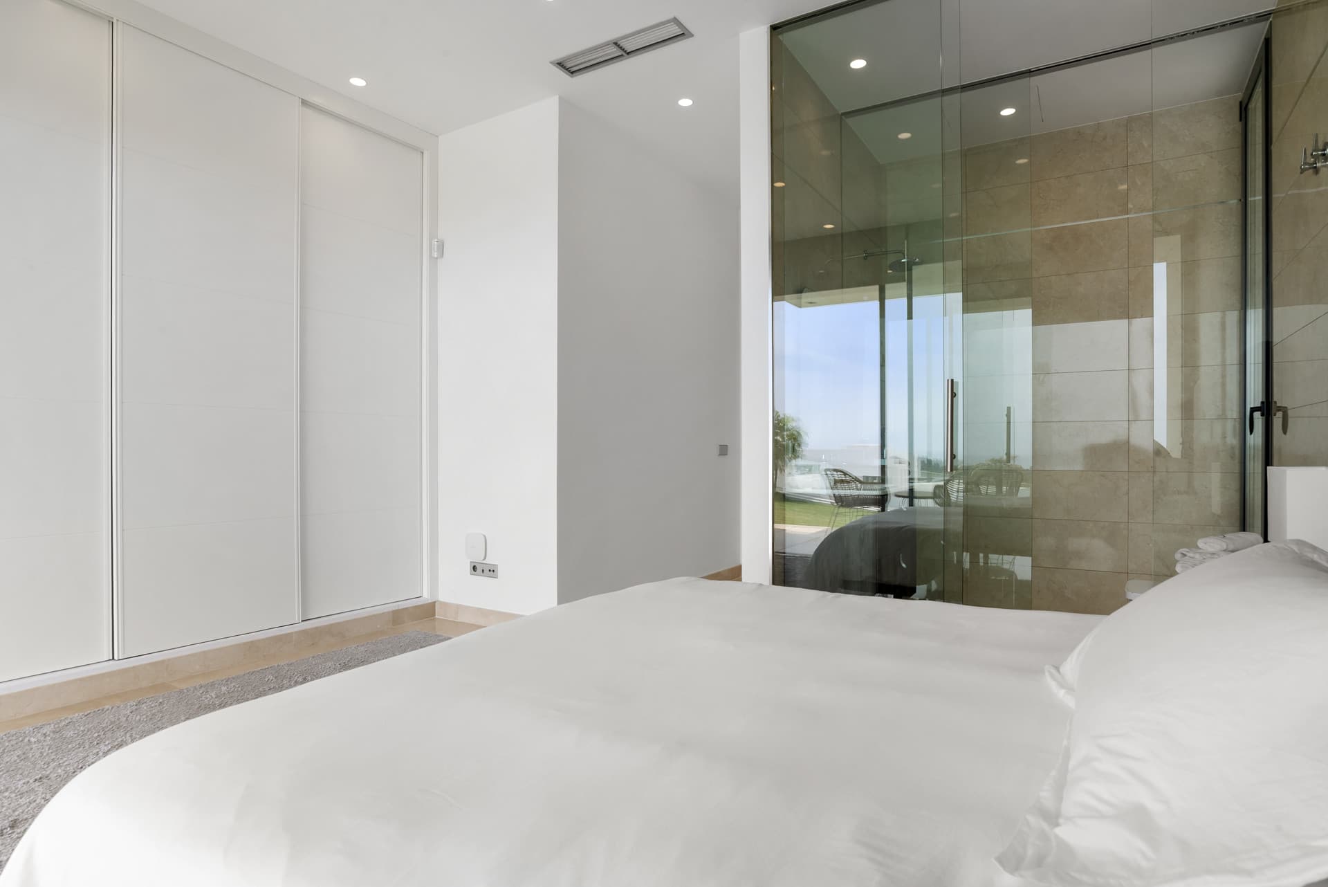Sophisticated Villa With Panoramic Vistas and Lush Greenery Set in the prestigious enclave of La Alquería in Benahavís,
