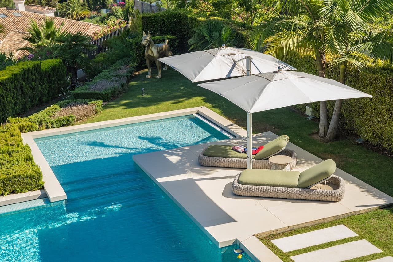 This exceptional villa is nestled within an exclusive gated community in Marbella’s prestigious Golden Mile