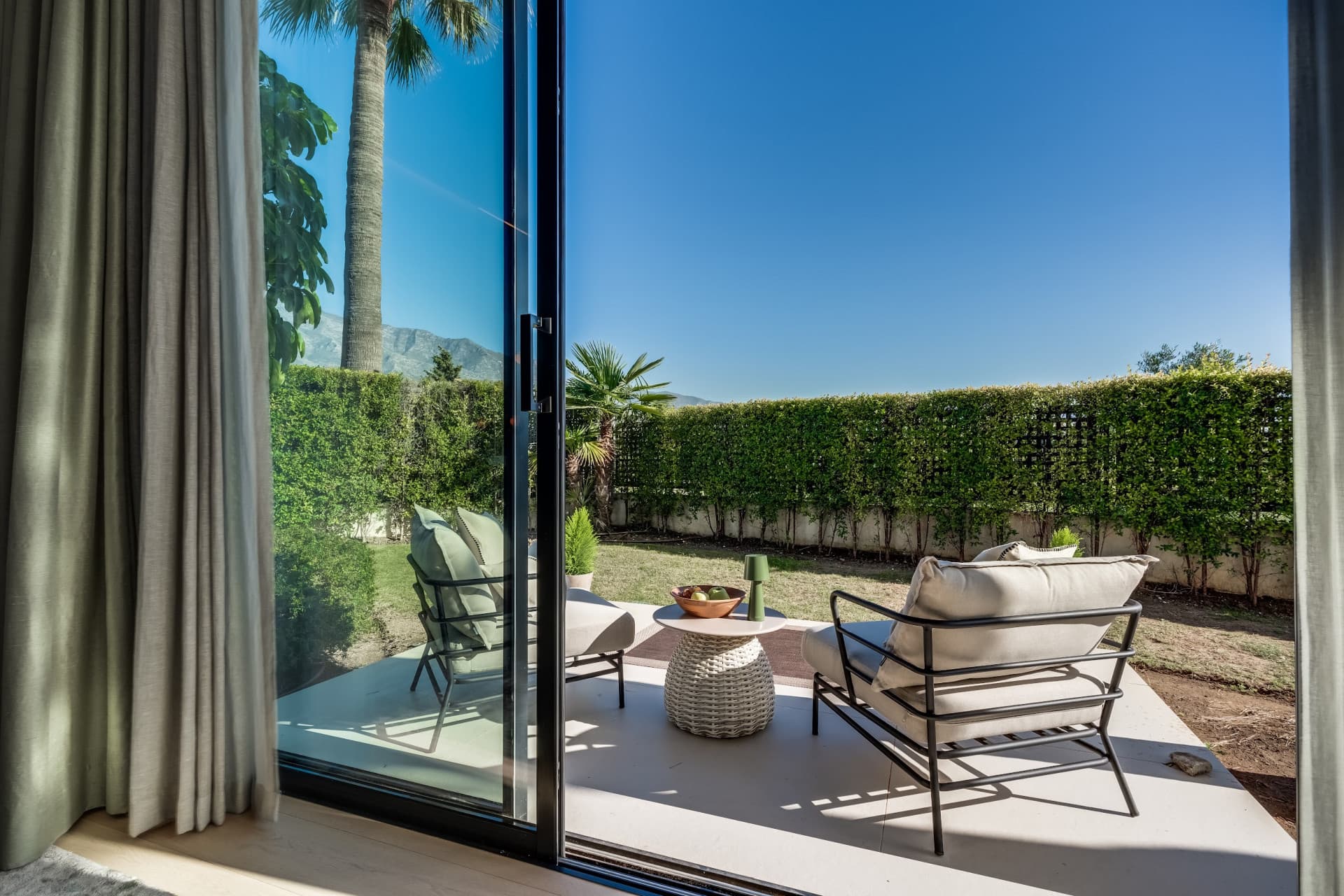 This exceptional villa is nestled within an exclusive gated community in Marbella’s prestigious Golden Mile