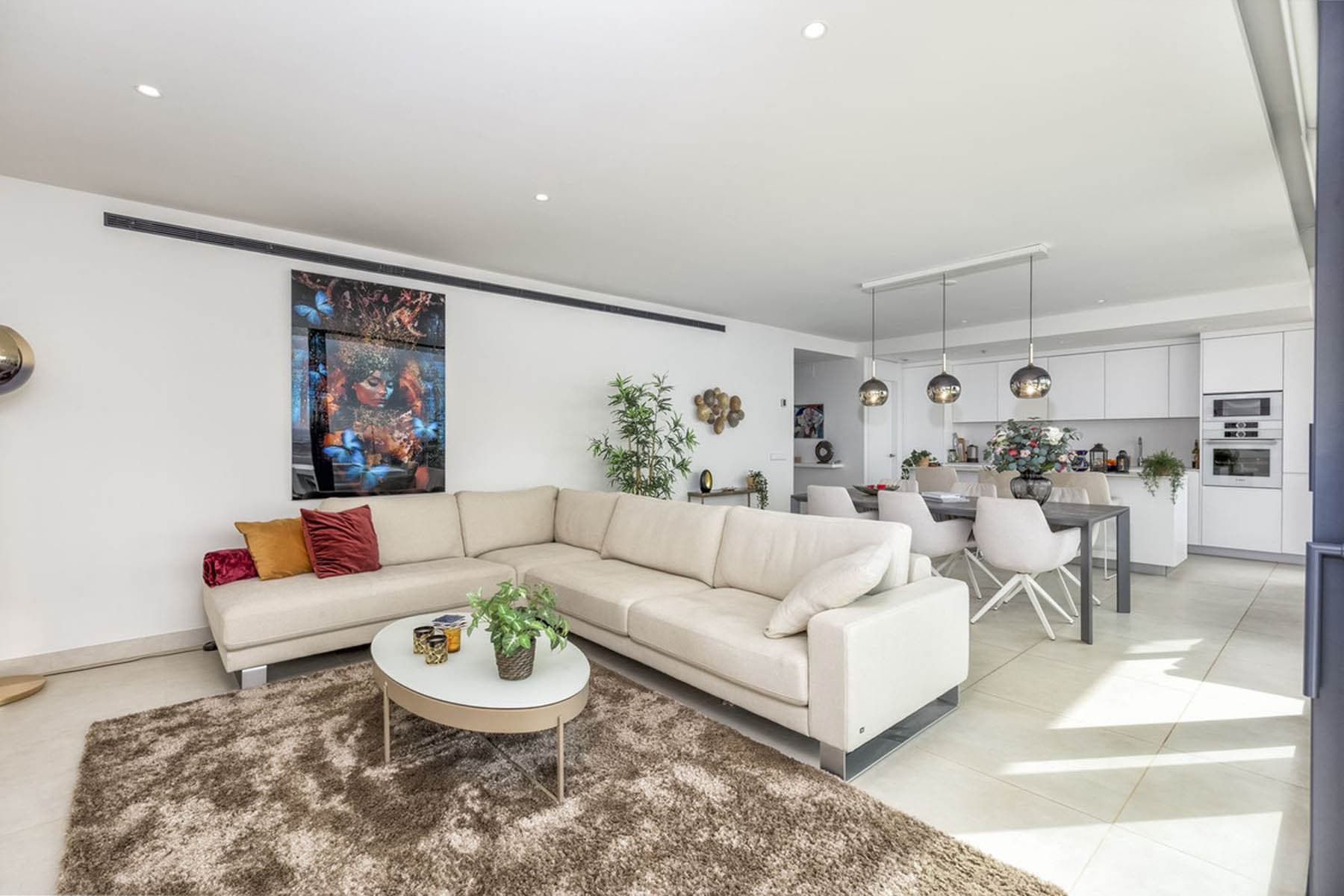 Experience the “wow” factor upon entry! This 3-bedroom, south-facing corner apartment offers an luxury open-plan living space that flows onto a very large terrace with stunning sea and mountain views. High-end kitchen appliances make...