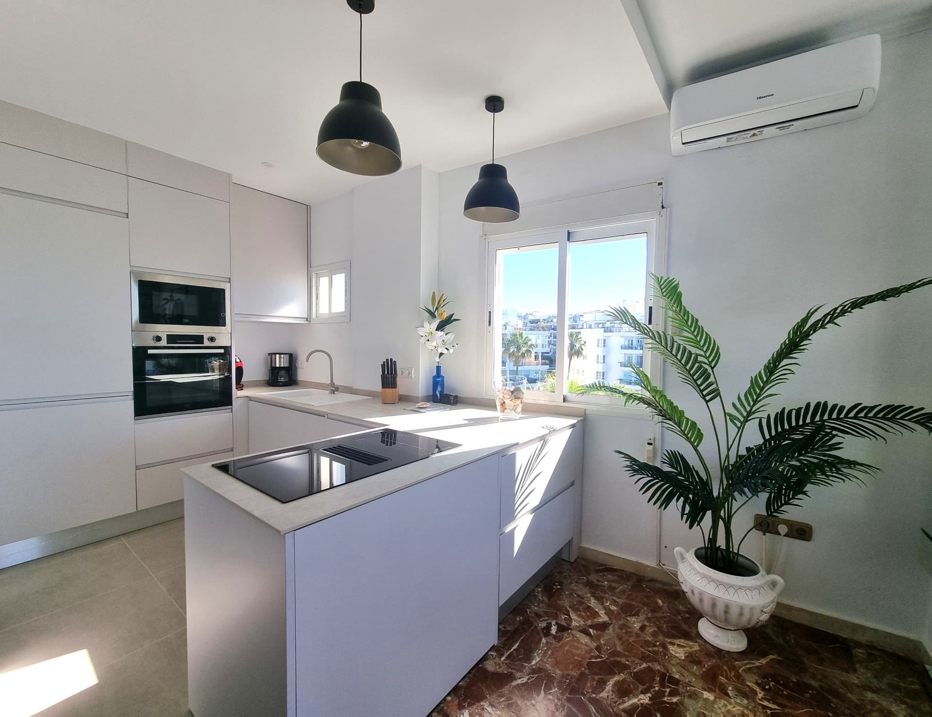 This exclusive 4th-floor apartment is a true coastal sanctuary, offering uninterrupted sea views and direct access to pristine beaches and lush communal gardens.