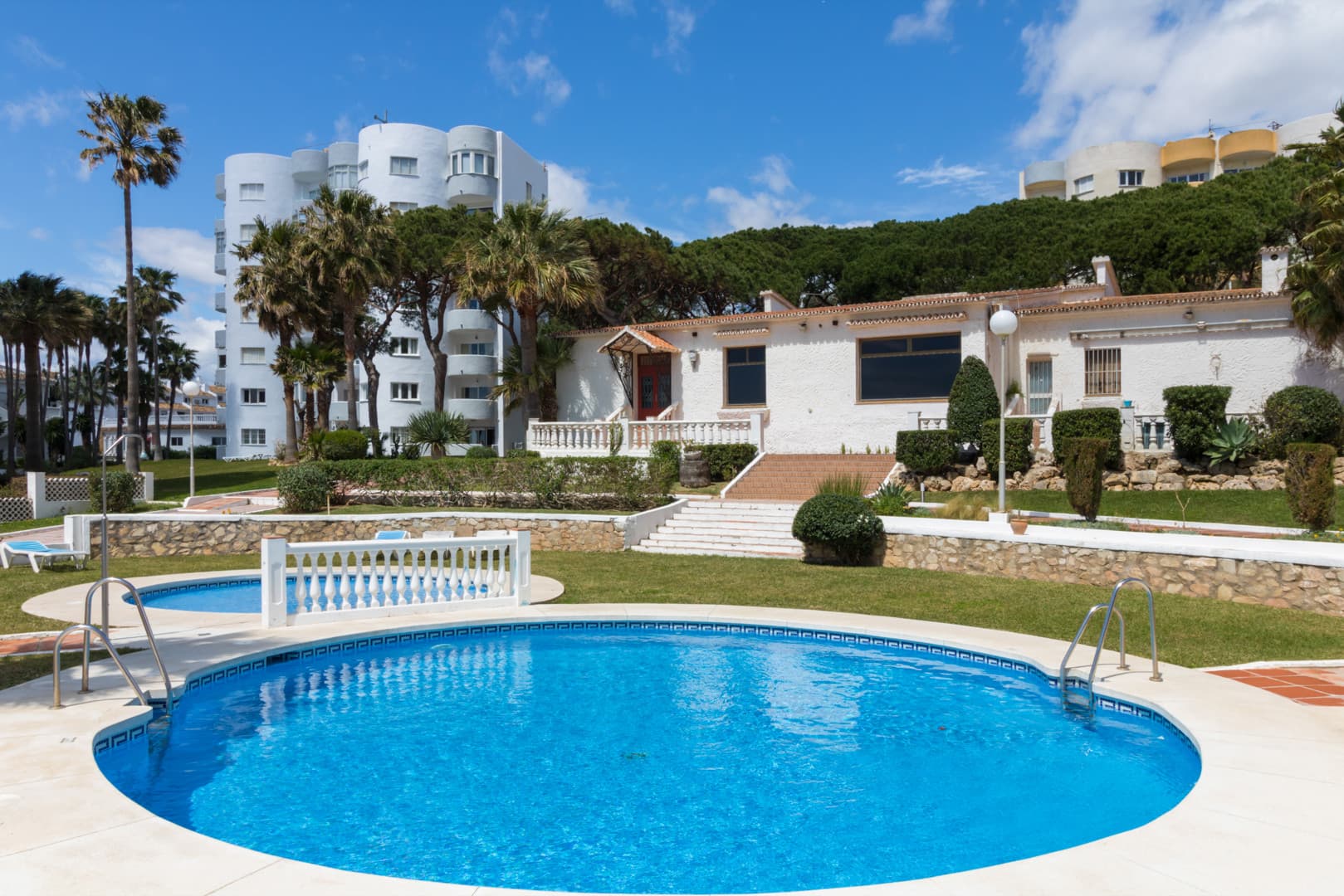 This exclusive 4th-floor apartment is a true coastal sanctuary, offering uninterrupted sea views and direct access to pristine beaches and lush communal gardens.
