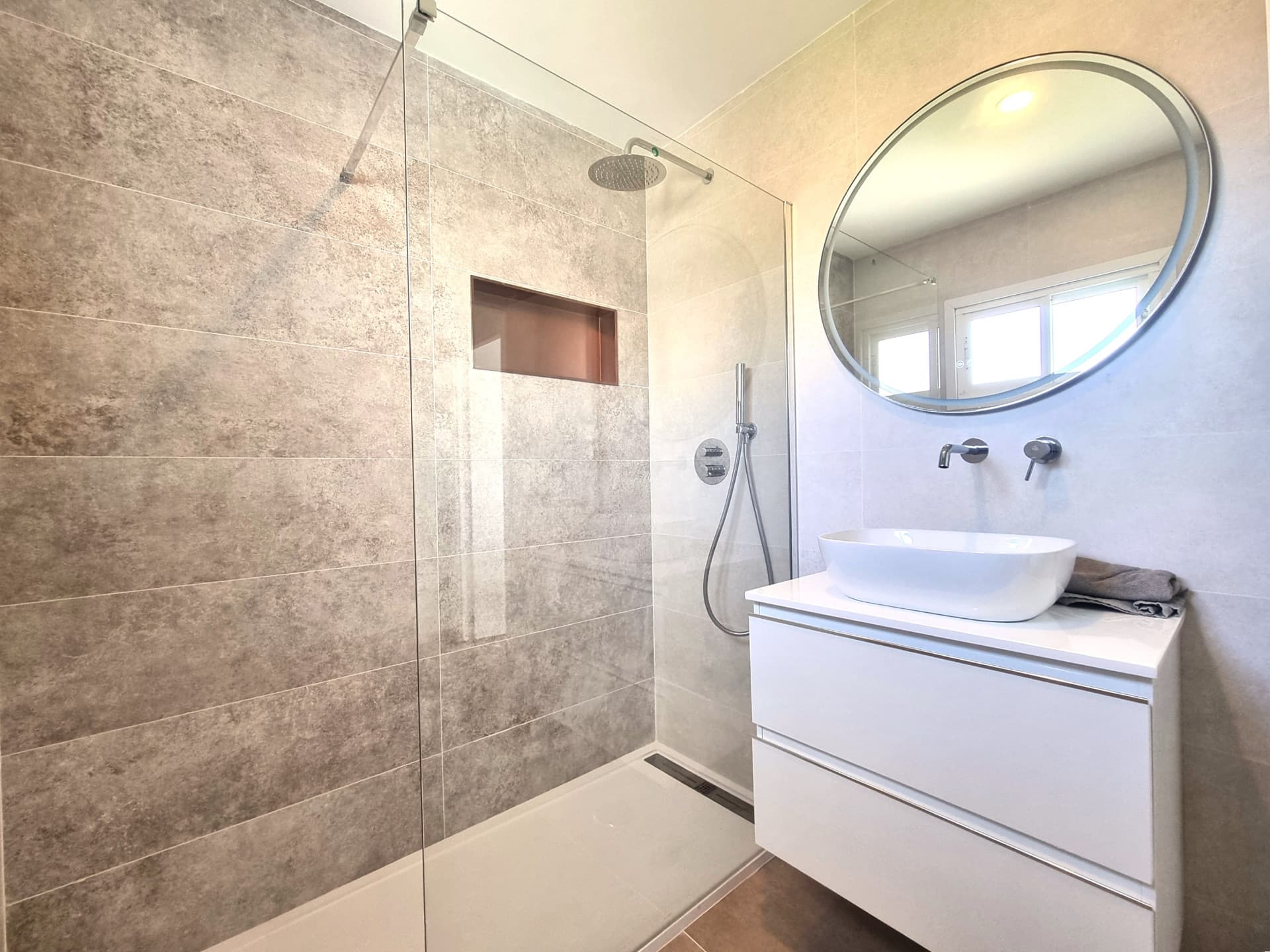 This exclusive 4th-floor apartment is a true coastal sanctuary, offering uninterrupted sea views and direct access to pristine beaches and lush communal gardens.