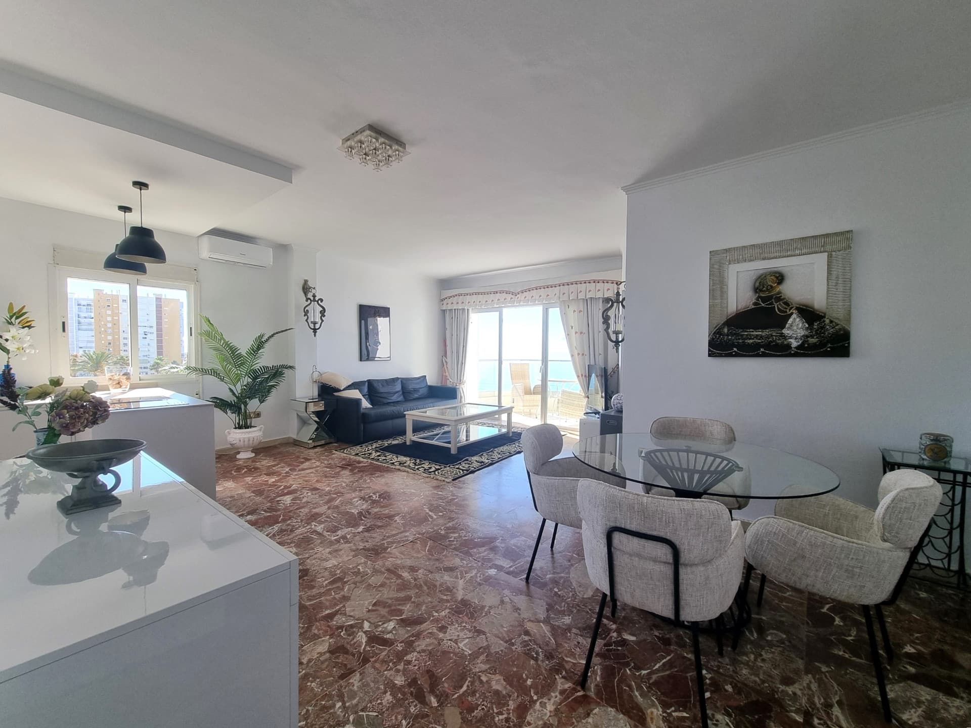 This exclusive 4th-floor apartment is a true coastal sanctuary, offering uninterrupted sea views and direct access to pristine beaches and lush communal gardens.