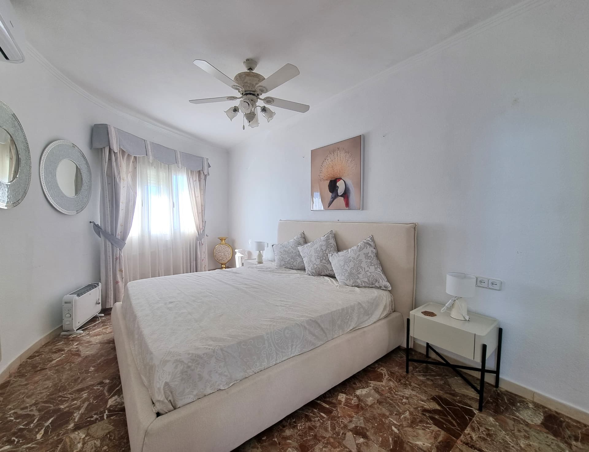 This exclusive 4th-floor apartment is a true coastal sanctuary, offering uninterrupted sea views and direct access to pristine beaches and lush communal gardens.