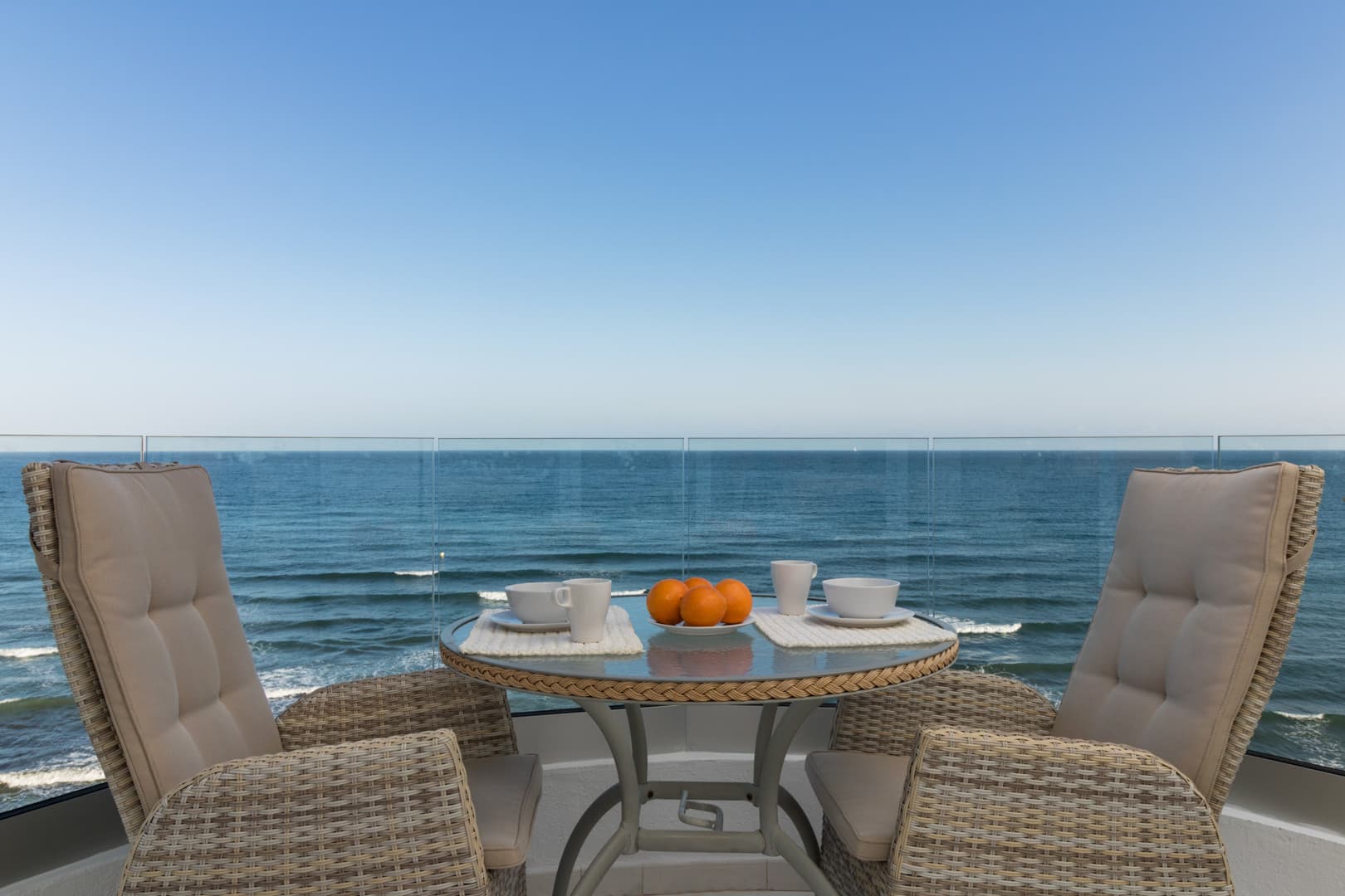 This exclusive 4th-floor apartment is a true coastal sanctuary, offering uninterrupted sea views and direct access to pristine beaches and lush communal gardens.