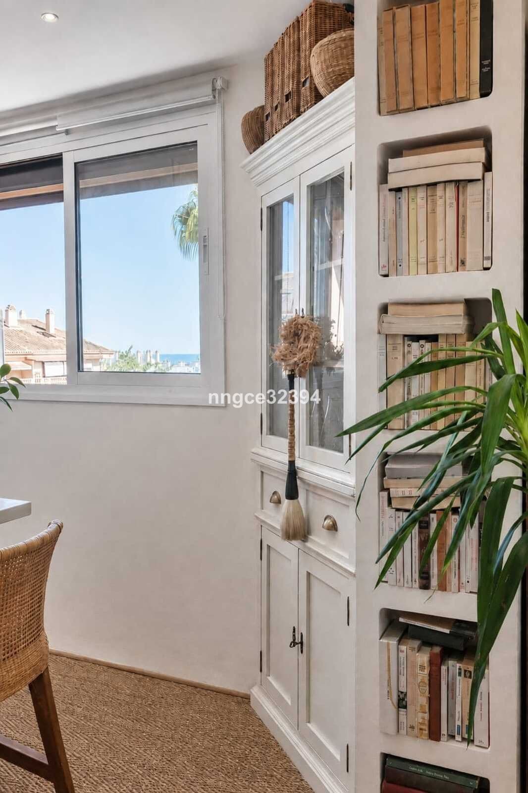 Top-Floor Designer Apartment on Marbella's Golden Mile | Sea Views, Terrace, Garage & Storage