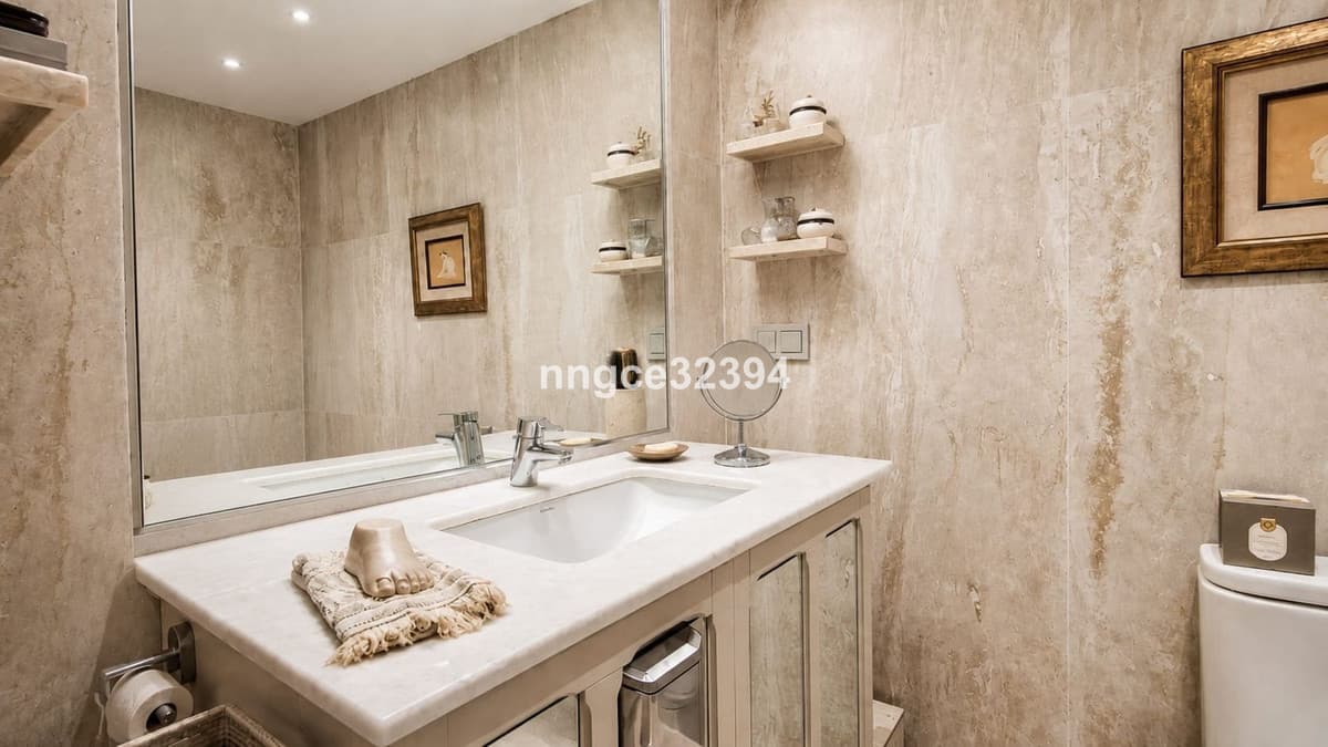 Top-Floor Designer Apartment on Marbella's Golden Mile | Sea Views, Terrace, Garage & Storage