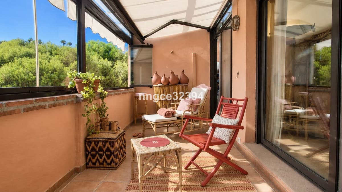 Top-Floor Designer Apartment on Marbella's Golden Mile | Sea Views, Terrace, Garage & Storage