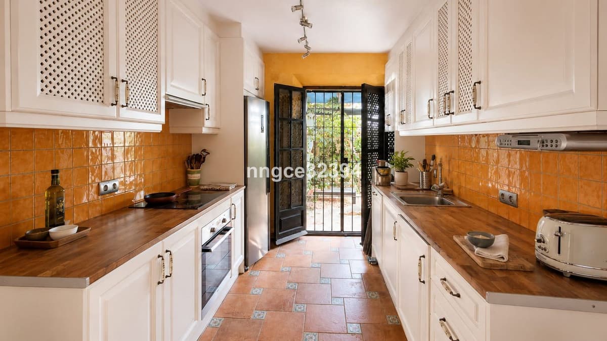 Tourist Licenced| Aloha, Nueva Andalucía | Charming 2-Bed Townhouse with Partial Sea Views, Pool, Tennis & Parking