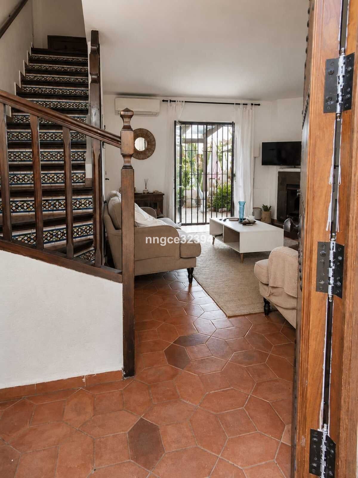 Tourist Licenced| Aloha, Nueva Andalucía | Charming 2-Bed Townhouse with Partial Sea Views, Pool, Tennis & Parking