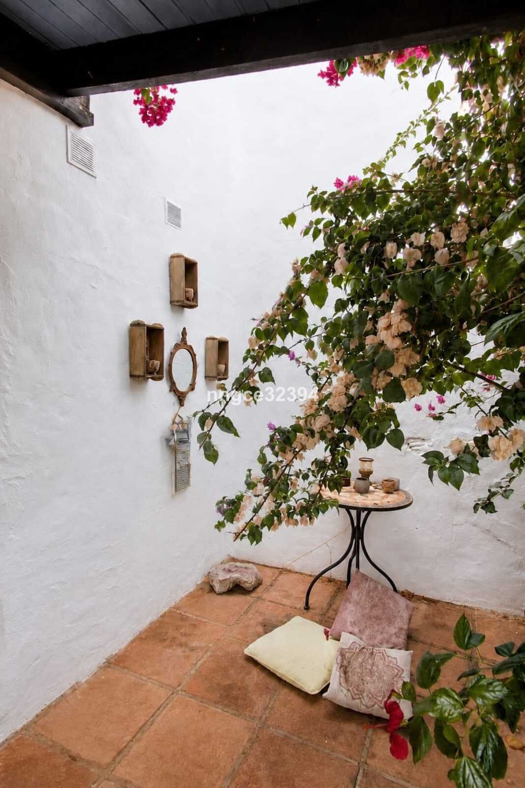 Tourist Licenced| Aloha, Nueva Andalucía | Charming 2-Bed Townhouse with Partial Sea Views, Pool, Tennis & Parking
