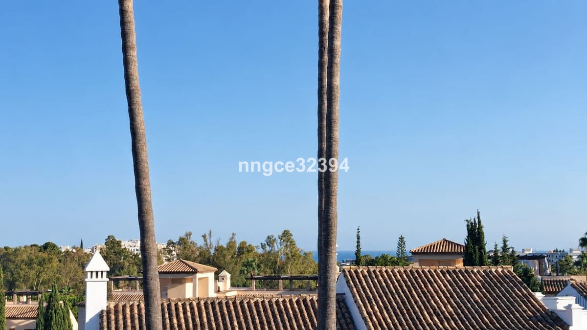 Tourist Licenced| Aloha, Nueva Andalucía | Charming 2-Bed Townhouse with Partial Sea Views, Pool, Tennis & Parking