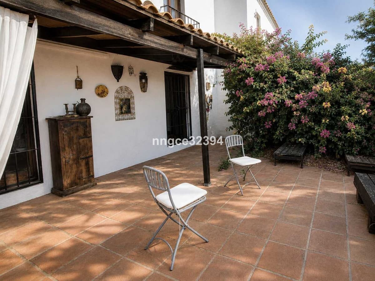 Tourist Licenced| Aloha, Nueva Andalucía | Charming 2-Bed Townhouse with Partial Sea Views, Pool, Tennis & Parking