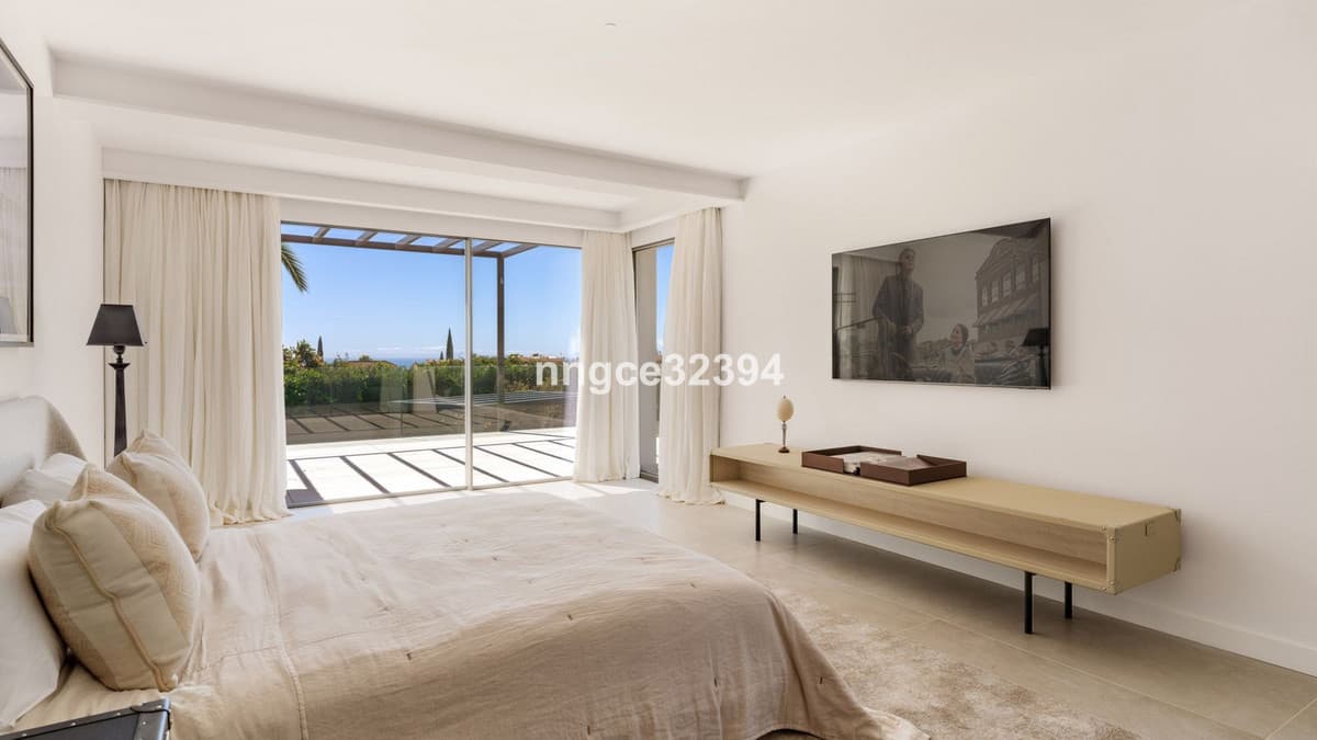 Sophisticated Modern Villa with Panoramic Views on Marbella's Golden Mile This exceptional five-bedroom villa, located o