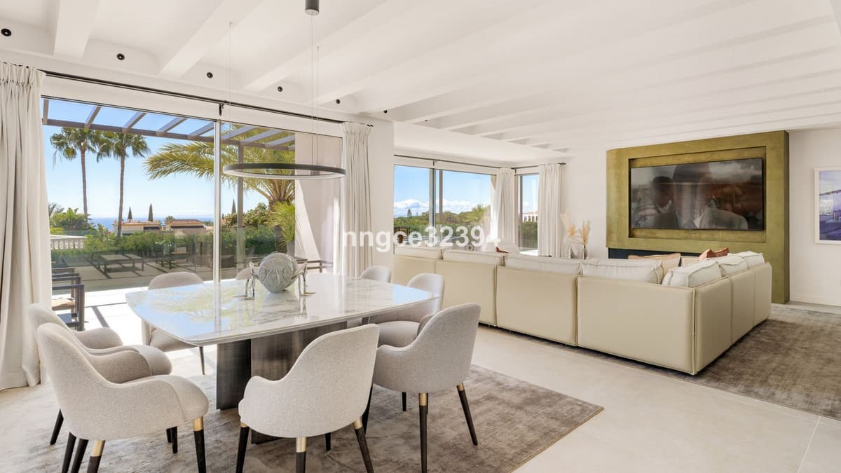 Sophisticated Modern Villa with Panoramic Views on Marbella's Golden Mile This exceptional five-bedroom villa, located o