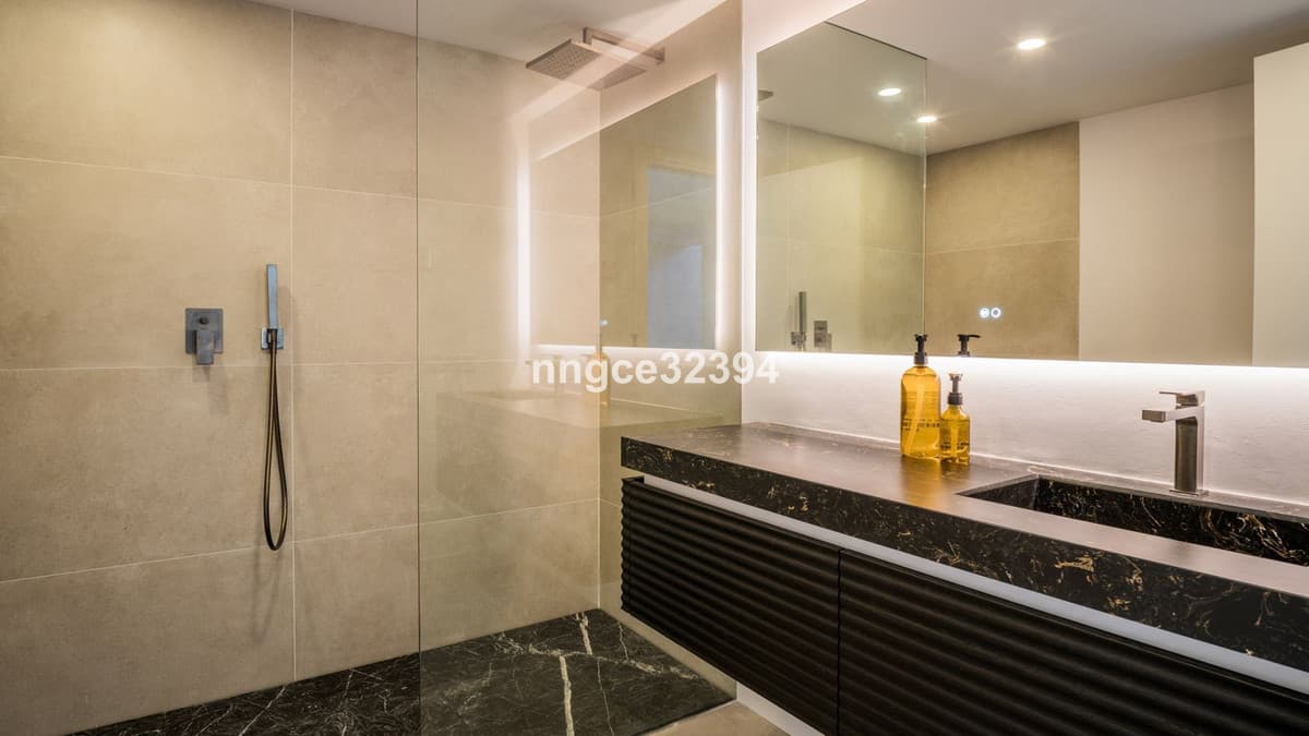 Sophisticated Modern Villa with Panoramic Views on Marbella's Golden Mile This exceptional five-bedroom villa, located o