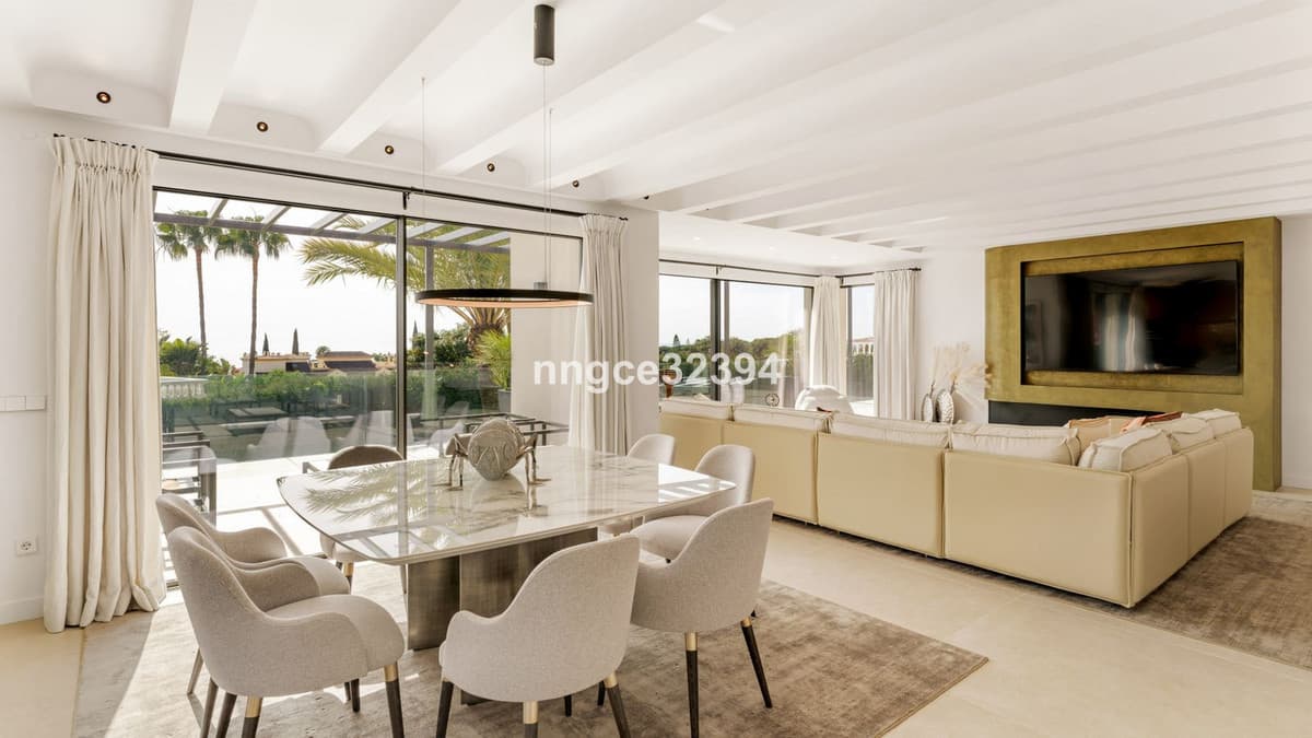 Sophisticated Modern Villa with Panoramic Views on Marbella's Golden Mile This exceptional five-bedroom villa, located o