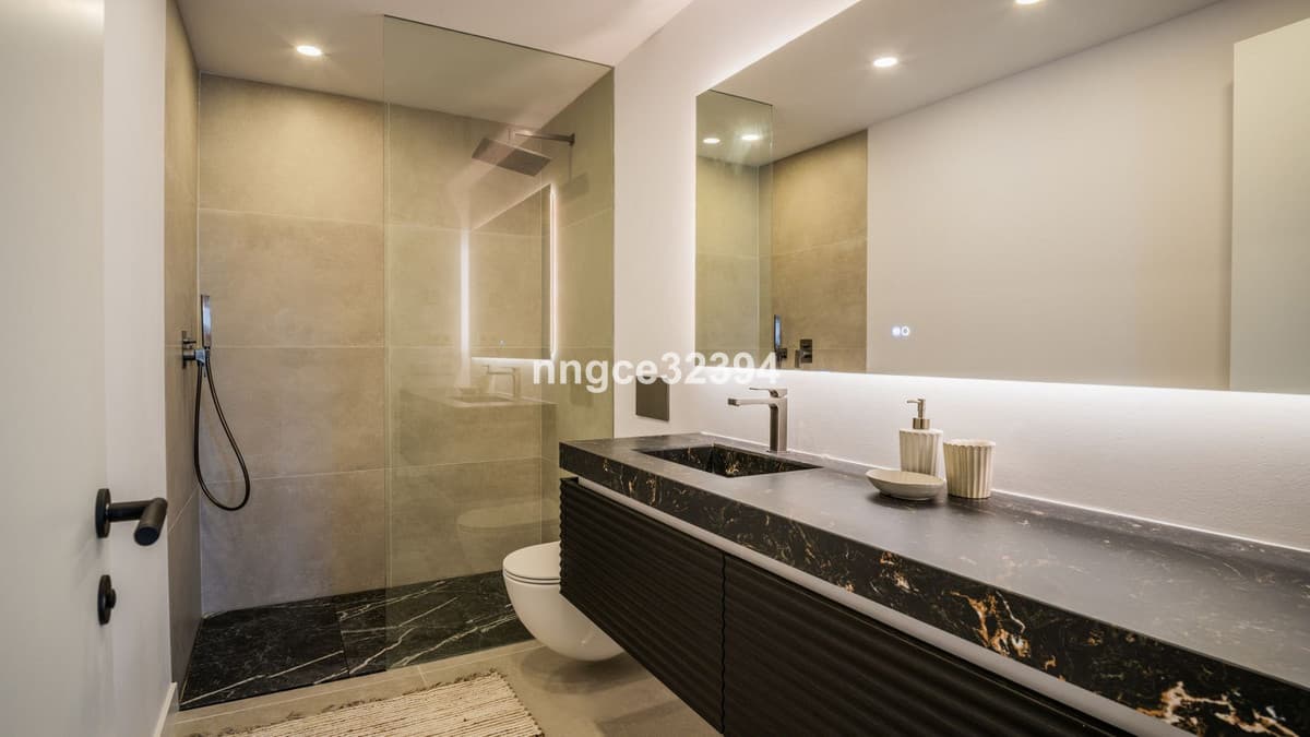 Sophisticated Modern Villa with Panoramic Views on Marbella's Golden Mile This exceptional five-bedroom villa, located o