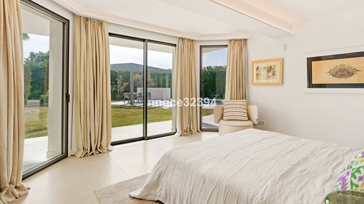 Sophisticated Modern Villa with Panoramic Views on Marbella's Golden Mile This exceptional five-bedroom villa, located o