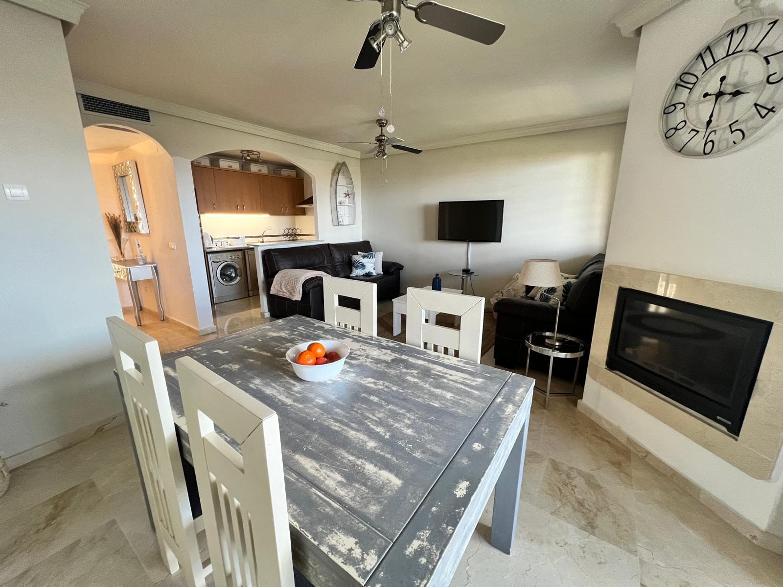 Stylish 2-bedroom apartment in Duquesa Fairways with two private terraces, golf views, and access to pools, gardens, and underground parking—just minutes from the marina and beach.