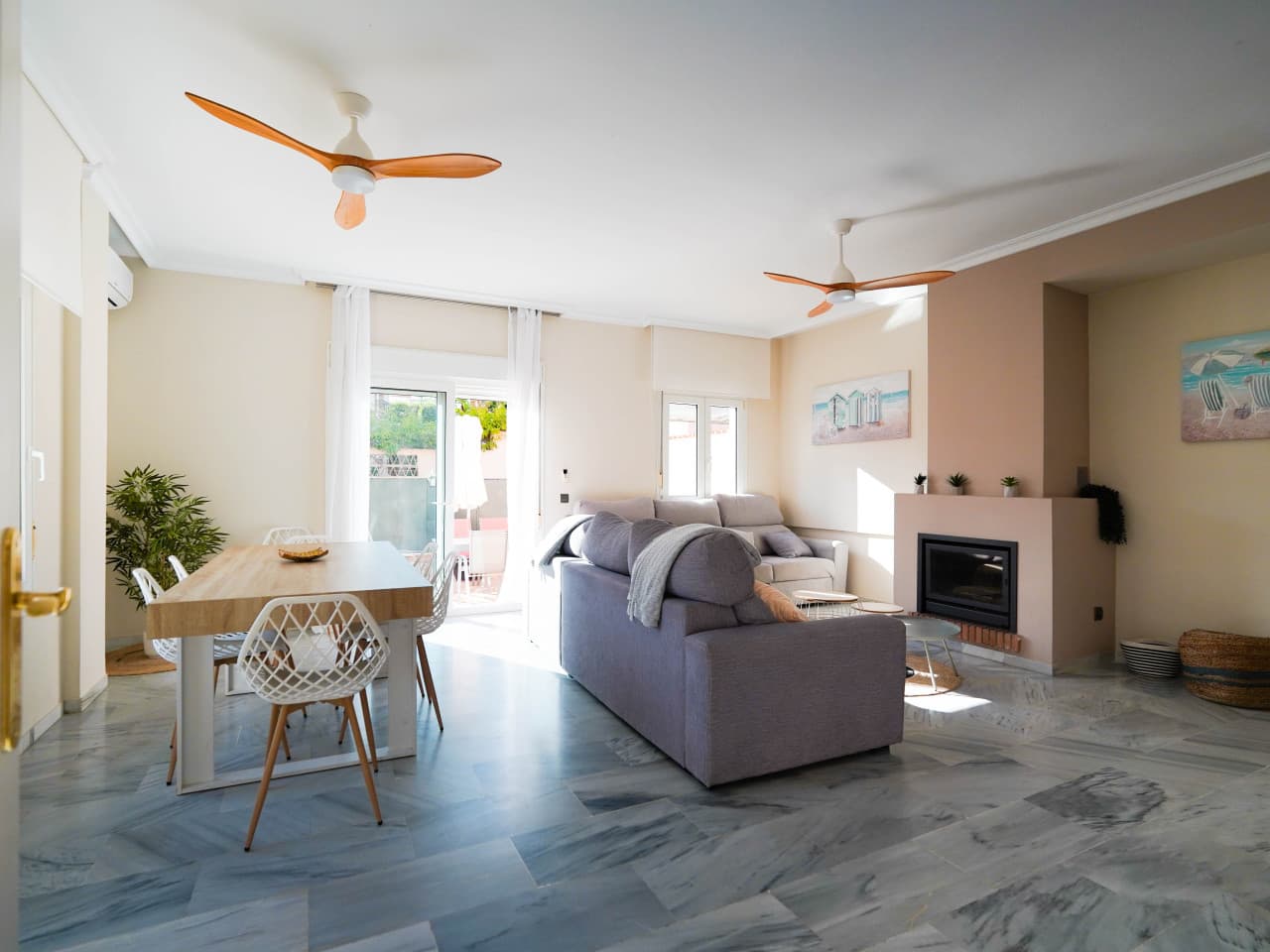 This semi-detached house in Río Real, Marbella, with a private pool and landscaped garden, offers 250 m² built on a 329